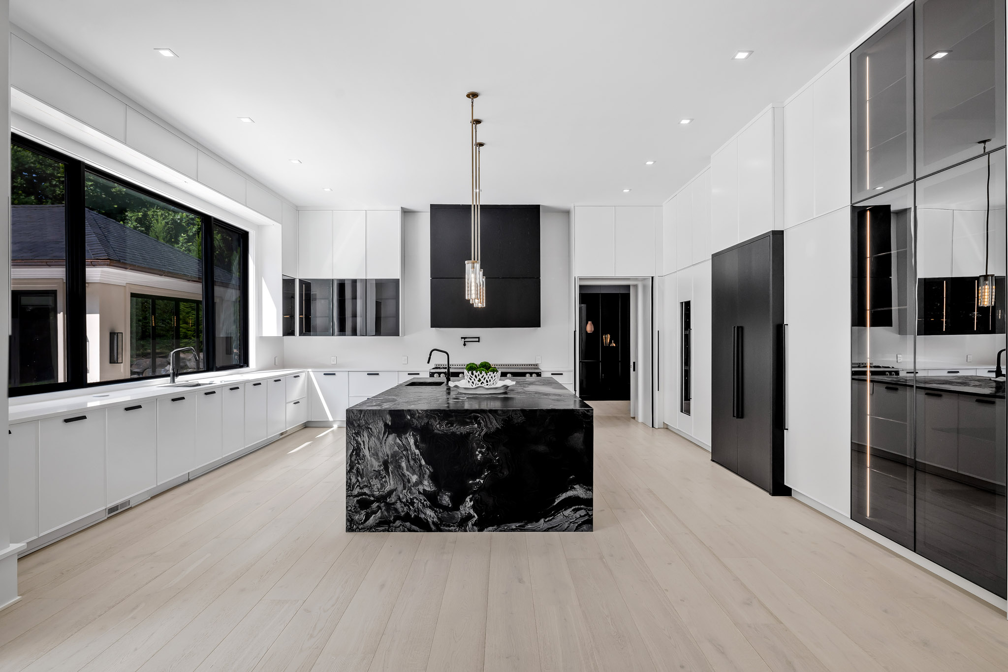 Luxury kitchen with sculptural black marble island